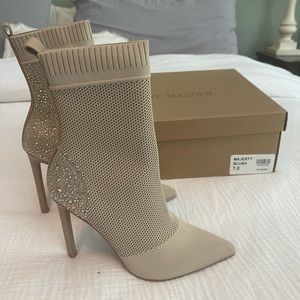 Steve Madden Pump Booties - never worn - given as a gift. Not my size.